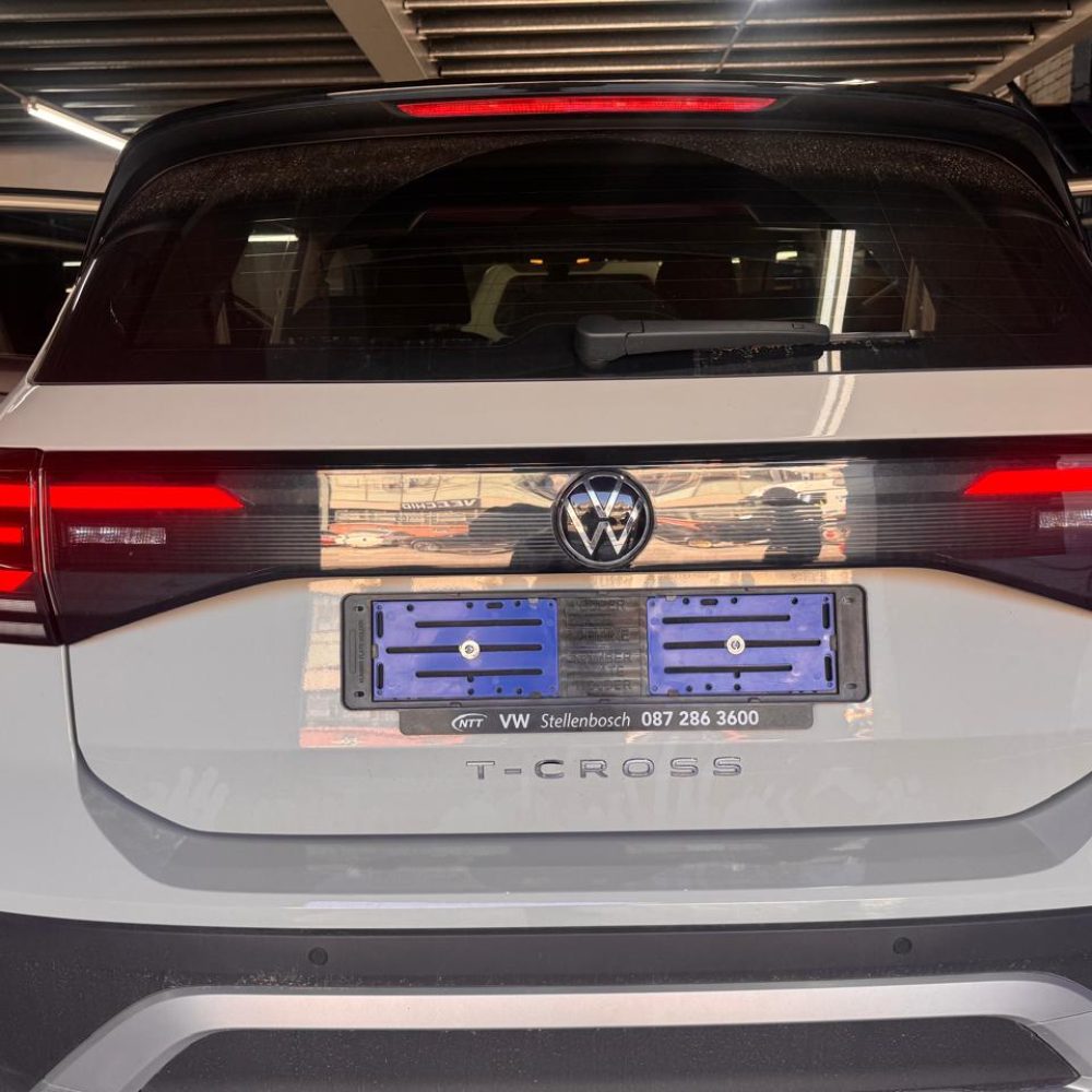 VW T Cross with red saddle stitching 1