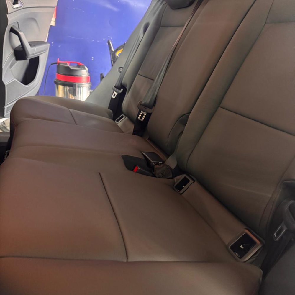 VW T Cross with red saddle stitching 2